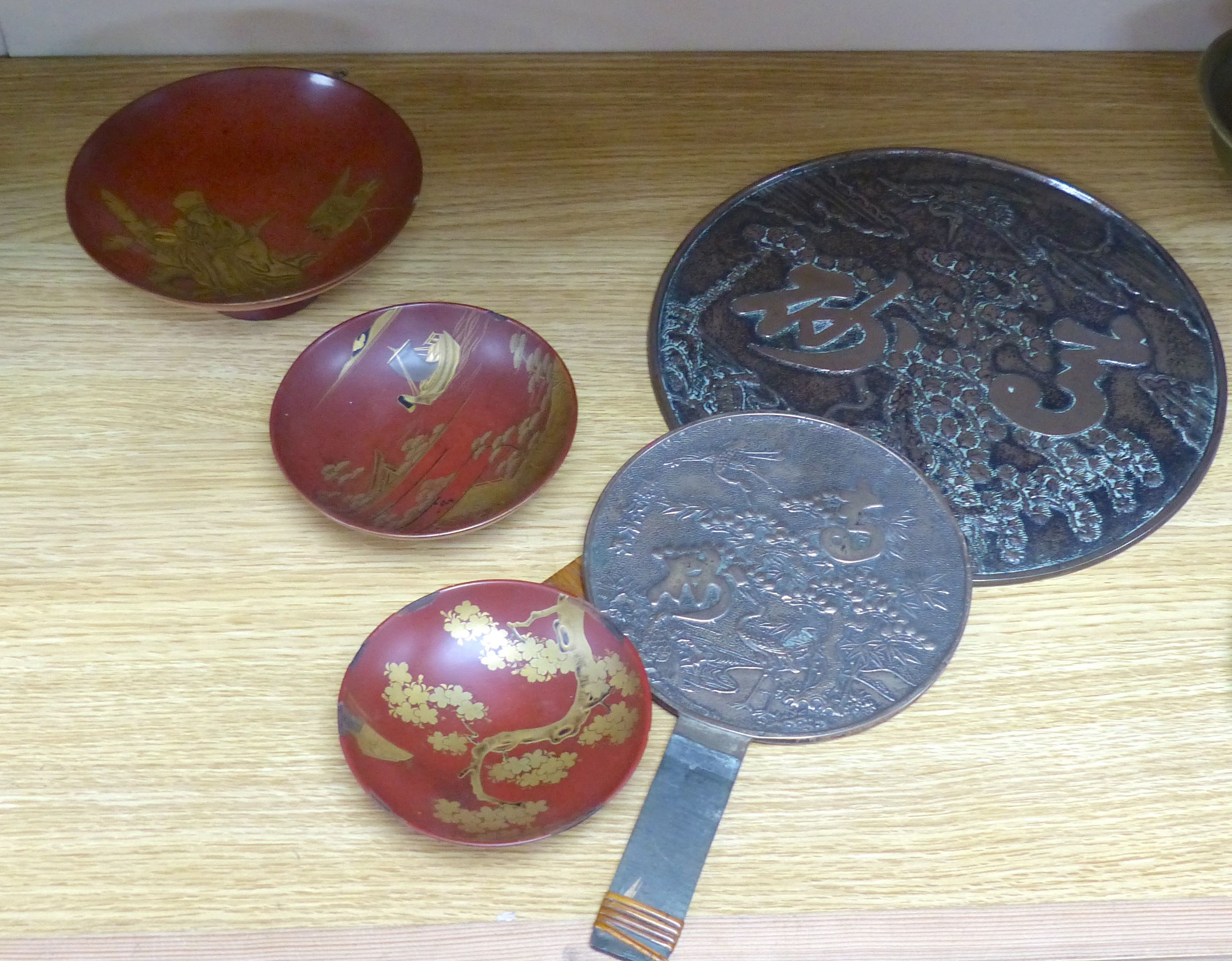 A Japanese lacquer makie three set of bowls and two mirrors, Edo to Meiji, tallest 32cm